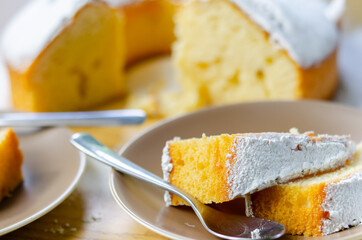 Portion of Madeira ring loaf cake served on a small plate