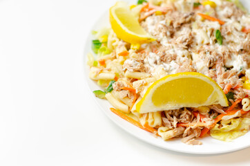 Cavatelli pasta with tuna and iceberg lettuce, carrots, sweet corn and cucumber in a sauce mayonnaise