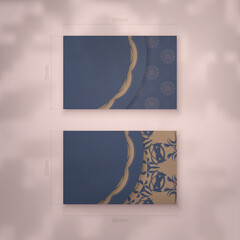 Business card in blue with vintage brown pattern for your personality.