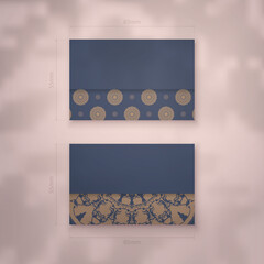 Business card template in blue with a greek brown pattern for your contacts.
