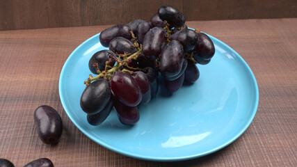Natural organic different types of fresh ripe juicy grapes and space for text on table. top view, Agriculture concepts.