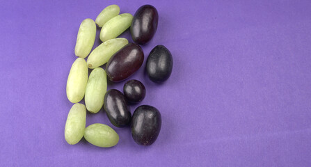 Natural organic different types of fresh ripe juicy grapes and space for text on table. top view, Agriculture concepts.