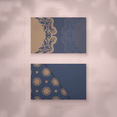 Business card template in blue with brown mandala ornament for your brand.