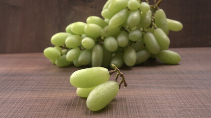 Natural organic different types of fresh ripe juicy grapes and space for text on table. top view, Agriculture concepts.