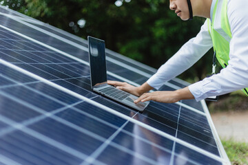 Engineer check data from the sensor of solar cells panel