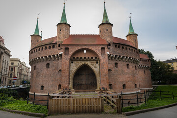 Fototapeta premium Barbican (Barbakan) in Cracow, Poland. The best preserved medieval barbican in Europe