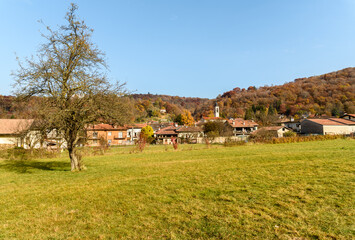 Rural scenery at autumn season of little Italian village Brinzio located in valley Rasa in province of Varese, Lombardy, Italy