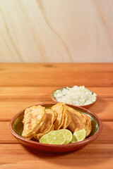 Authentic barbacoa tacos on wooden table. Mexican food concept.