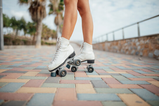 Legs of unrecognizable roller skater