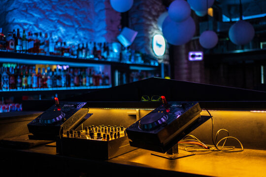 DJ counter with sound mixer and discs