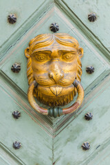 Old door with an interesting ornament, close-up.