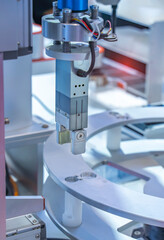 Robot arm with test tube for biological experiments in laboratory
