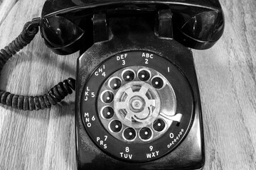 Rotary telephone - Antique, black and heavy. Before cell phones, people had to dial phone numbers...