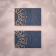 Business card template in blue with vintage brown pattern for your business.