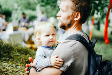 I love you, dad! Handsome young man at home with his little cute girl. Happy Father's Day!