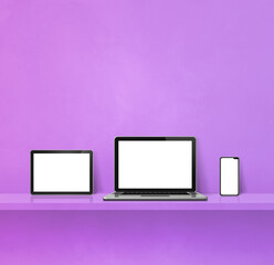 Laptop, mobile phone and digital tablet pc on purple wall shelf. Square background