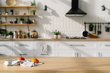 Small pumpkins in scandinavian style kitchen interior