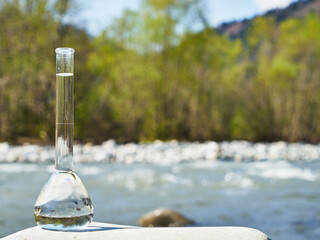 Glass flask with clean drinking water.