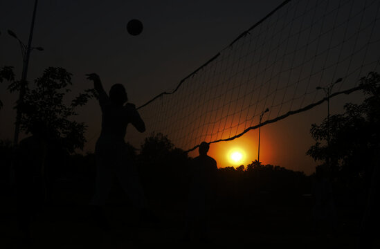Pakistan, Islamabad 19 September 2021 Citizens enjoy playing volleyball on Roadside..Raja  Imran  