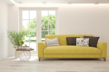Stylish room in white color with sofa and summer landscape in window. Scandinavian interior design. 3D illustration