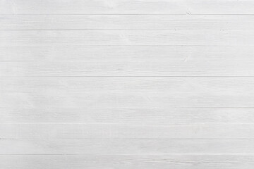 Vintage white wooden table top view texture background. Clean bright painted wooden planks pattern...