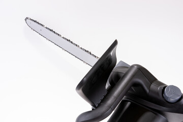Close up of the new chain of a chainsaw. Isolated on white