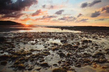 Obraz premium Sunset At The Blue Sea