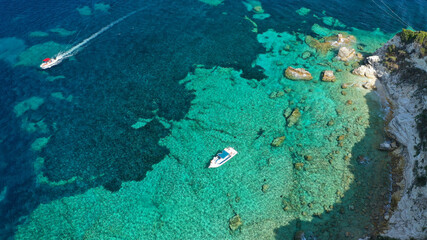 Fototapeta na wymiar Aerial drone photo of paradise white rocky bay and beach in island of Antipaxos, Ionian, Greece