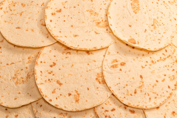 Grilled pitta bread isolated on white background.