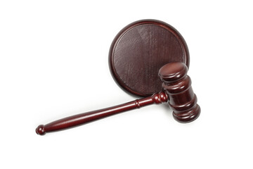 Wooden judge gavel and soundboard isolated on a white background.