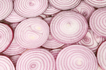 Onion slices as a background. Top view.