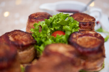 Meat rolls with herbs and sauce
