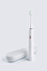 Smart electric toothbrush. Modern technology for health. Healthy teeth. Dentistry. Concept of professional oral care and healthy teeth by using ultrasonic smart toothbrush. 