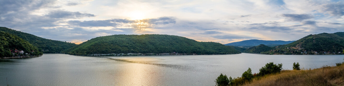 Beautiful lake in East Serbia with clouds and sunset. Sunset at the lake.