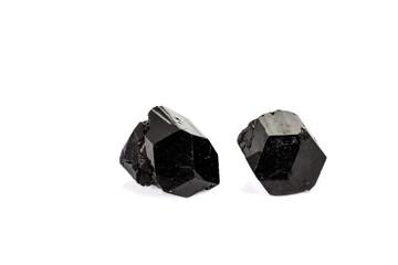 macro mineral stone schorl, black tourmaline on white background