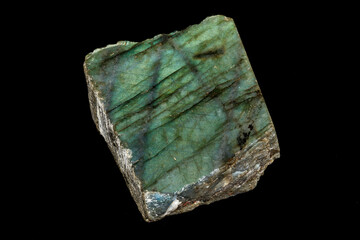 Macro of the stone Labradorite mineral on a black background