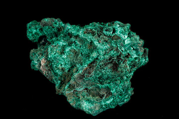 Macro of a mineral stone Malachite on a black background