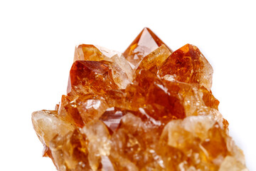 Macro mineral stone Citrine in rock in crystals on a white background