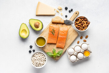 Healthy food menu: fish meat, vegetables, eggs and nuts. Diet menu.