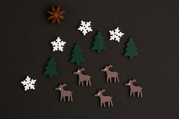 Fototapeta na wymiar set of decorative christmas items on black background