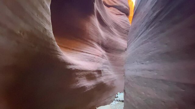 Hiking through slot canoyn in Utah