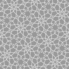 Pattern with vintage abstract floral elements. Intersecting curved elegant stylized leaves and background forming abstract floral ornament in Arabic style. Arabesque design. Decorative lattice.