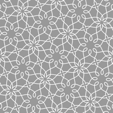 Pattern with vintage abstract floral elements. Intersecting curved elegant stylized leaves and background forming abstract floral ornament in Arabic style. Arabesque design. Decorative lattice.