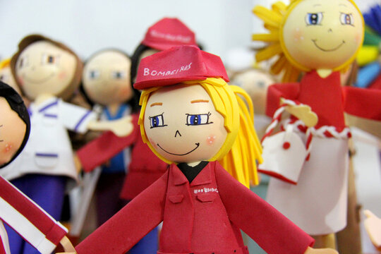 Selection of colorful handmade puppet  rag dolls. 