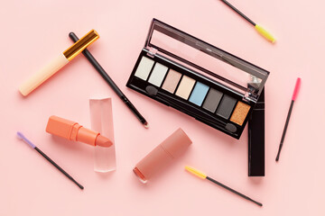 Set decorative cosmetics on pink background. Top view. Flat lay