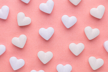 Obraz premium Composition with candy hearts on pastel blue background.