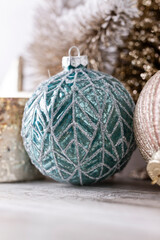 Golden christmas balls with bokeh background.