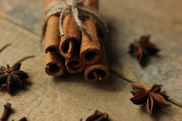 Bunch of cinnamon sticks, anise stars, carnation sprigs