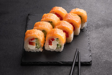 Philadelphia Sushi Rolls Set with Salmon and Cream Cheese. Japanese cuisine. Tasty food. Fish and rice.