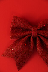 Red bow placed on the right side of the picture.